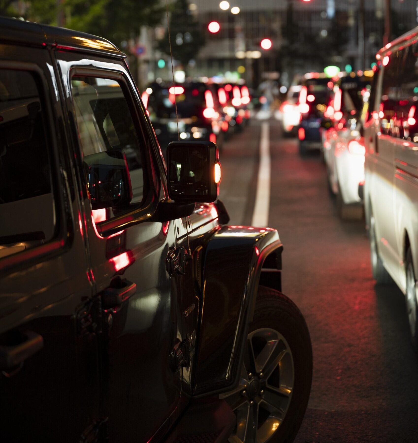 people-driving-cars-city-street